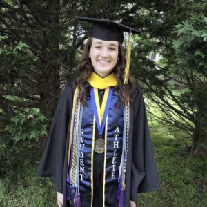 Headshot of Annie Menninger in grad reglia.